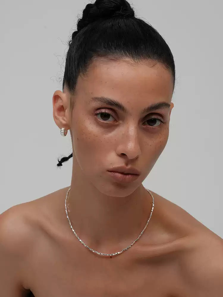 Broken silver stone bead necklace