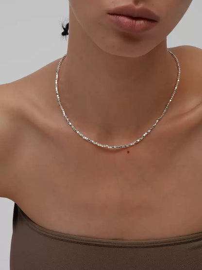 Broken silver stone bead necklace