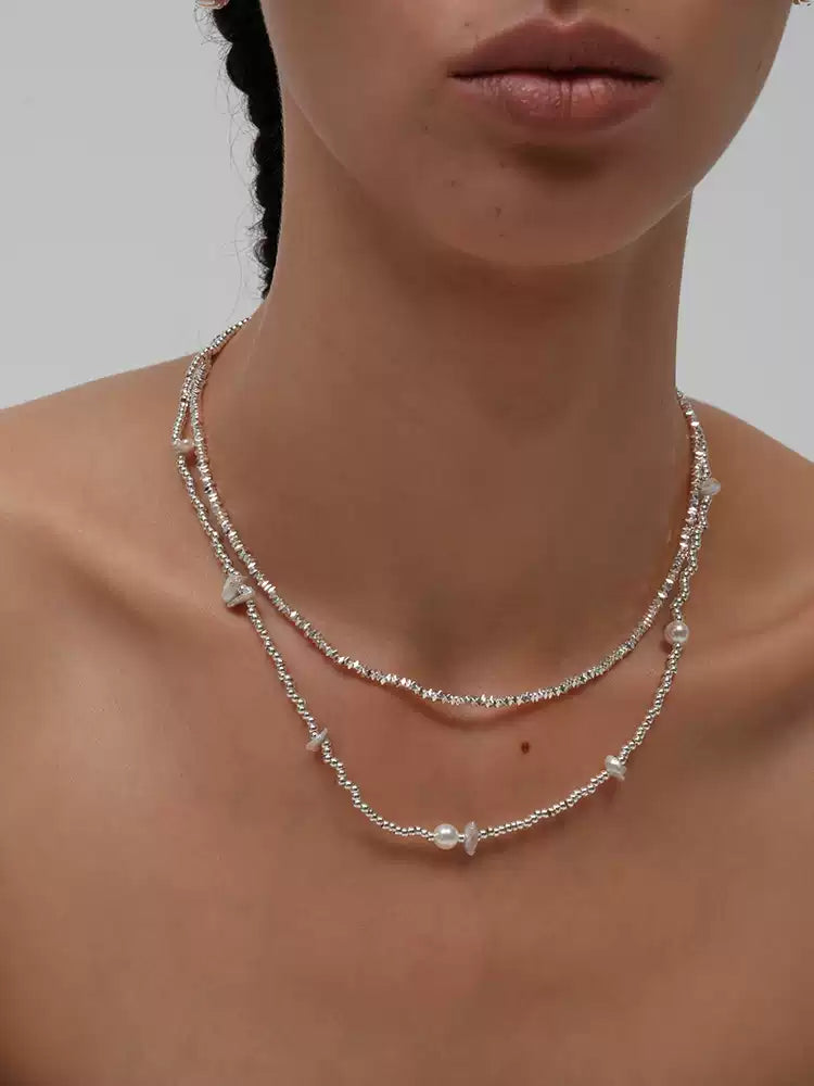 Broken silver stone bead necklace