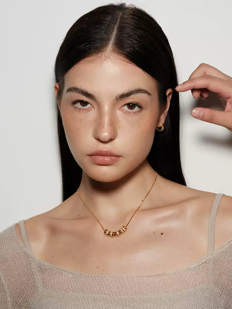 18k gold plated flat bead with diamond inlay necklace