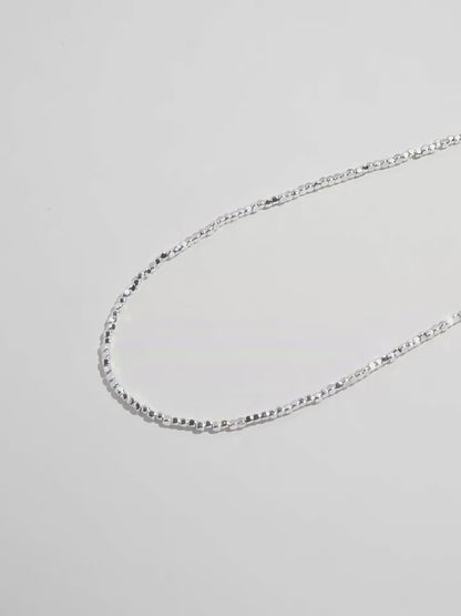 Broken silver stone bead necklace