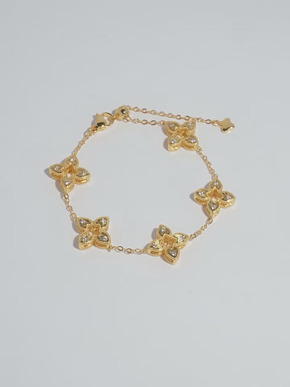 Hollowed-out four-leaf clover with diamond inlay bracelet
